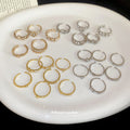 Gold and Silver Tone Crystal Ring Assortment in Four Sets view 4