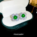 Silver Tone Crystal Flower Stud Earrings With Bright Green Centers view 1
