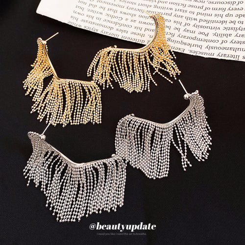 Styled view of metal beaded chain fringe stud earrings in two tones