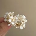 White Flower and Pearl Cluster Statement Stud Earrings view 4