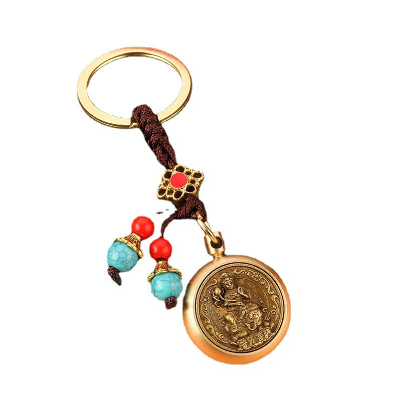 Brass Rotating Guardian Deity Keychain with Green Bead Cord