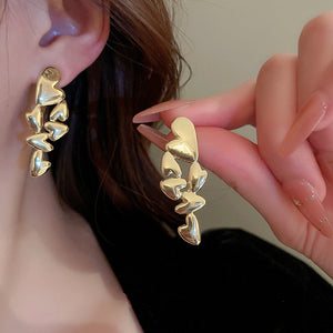 Polished Brass Heart Stud Earrings with a Gold-Tone Cascading Drop