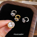 Round Crystal Huggie Earrings in Silver and Gold Tone view 3