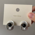 Silver Tone Textured Disc Stud Earrings With Black Centers view 3