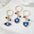 Rhinestone Blue Evil Eye Keychains in Heart, Round and Eye Shapes view 1
