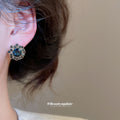 Blue Crystal Flower Halo Stud Earrings with Gold Tone Trim view 3