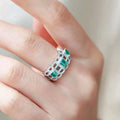 White Gold Openwork Ring Green Square Stones Pavé Band view 3