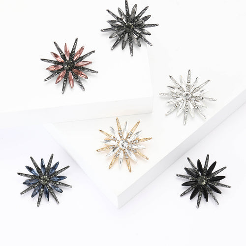Rhinestone Starburst Brooch shown on a clean white display
