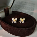 Mini Gold Tone Pave Clear Stone Flower Stud Earrings view 1
