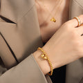 Gold Lotus Seed Pod Charm Necklace And Hoop Drop Earrings view 1