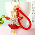 Crowned Winged Pig Keychains with Braided and Bare Wrist Loops view 2