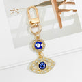 Gold Crystal Evil Eye Keychain With Butterfly And Bear Charm view 10