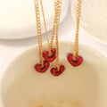 Red Hollow Heart Hoop Earrings Or Gold Pendant Necklace view 3