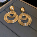 Layered Wire Circle Drop Earrings in Three Metallic Tones view 7