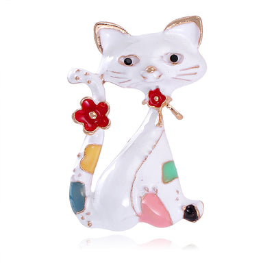 Front product view of an enamel cat brooch
