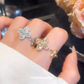 Open Four-Petal Zircon Flower Rings Gold and Silver view 3