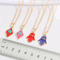 Gold Tone Enamel Hamsa Evil Eye Pendant Necklaces in Five Designs view 2