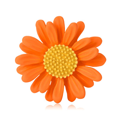 Front view of colorful daisy flower brooch with textured center decorative metal pin