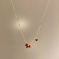 Gold Tone Necklace with Red Horse and Heart Charms view 4