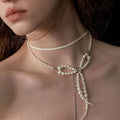 Pearl Bow Lariat Necklace With Long Silver Tone Chain Tassels view 3