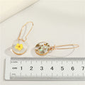 Gold Tone Round Clear Resin Flower Drop Earrings in Three Designs view 2