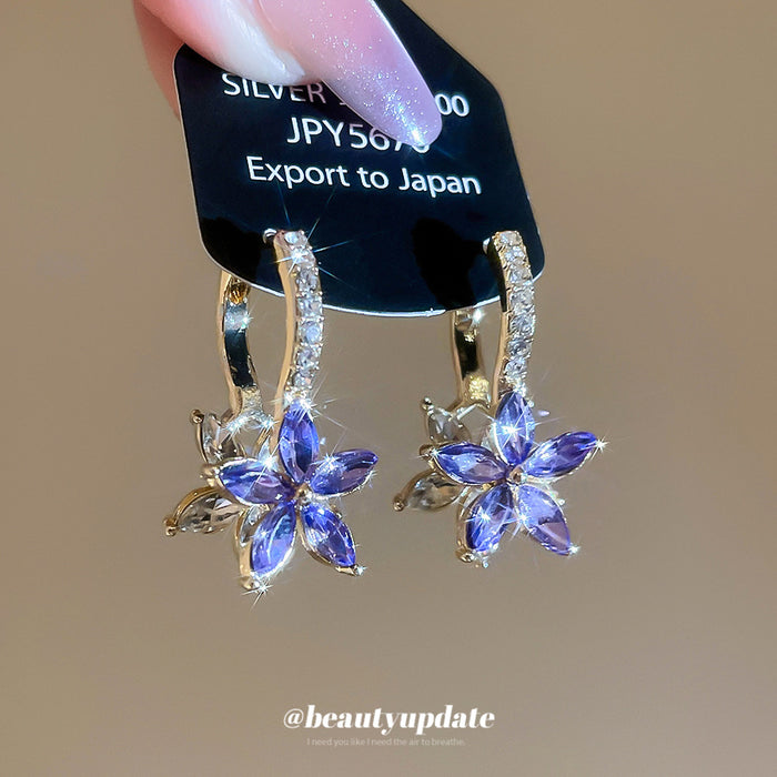 Purple Crystal Flower Huggie Earrings With Decorative Metal Details
