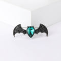 Black Crystal Bat Brooch With Faceted Green Heart Center view 6