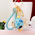 Jeweled Round Pufferfish Keychains in Four Colors with Braided Loops view 3