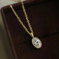Gold Oval Clear CZ Pendant Necklace with Beaded Bezel view 2