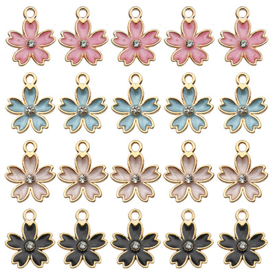 Colorful cherry blossom charms arranged on a light background