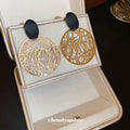 Gold Tone Openwork Disc Earrings With Black Oval Studs view 4