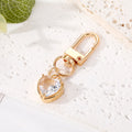Gold Tone Faceted Crystal Heart Clip Keychains in Eight Colors view 11