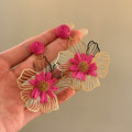 Wire Frame Flower Drop Earrings with Woven Rose Centers view 6