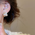 Gold Tone Floral Stud Earrings with Pearl Look Clusters view 3