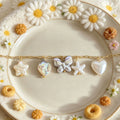 Ten Gold Tone Ocean Heart Butterfly Pendants And Bikini Clasps view 2