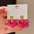 Fuchsia Open Diamond Drop Earrings With Gold Tone Studs view 3