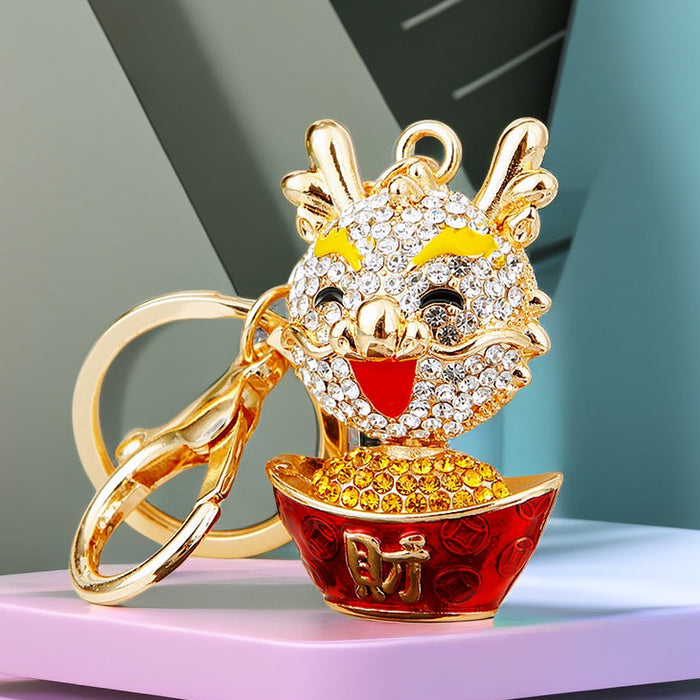 Jeweled Fortune Ingot and Auspicious Dragon Gold Tone Keychains
