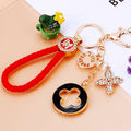Mixed Floral Clover Leaf and Daisy Charm Keychains with Wrist Loops view 2