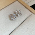 Crinkled Geometric Stud Earrings in Gold and Silver view 7