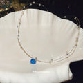 Silver Tone Double Strand Necklace With Blue Round Pendant view 4