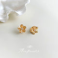 Gold Five Petal Flower Huggie Earrings Clear Center Stone view 1