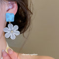 Blue Square and White Flower Drop Stud Earrings With Gold Tone Centers view 3