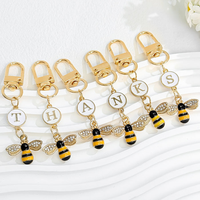 Gold-Tone Rhinestone Bee Keychain with Enamel Letter Charm