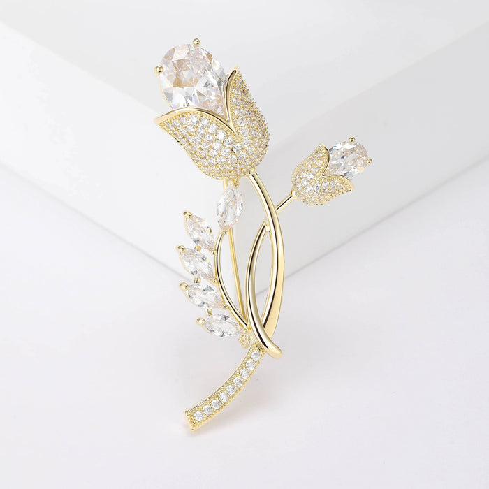 Gold Tone Tulip Stem Brooch With Clear Faceted Stones