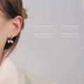 Gold-Tone Huggie Hoop Earrings Clear Crystal Bow Charms view 2