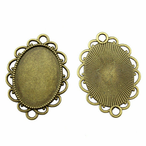 Round Loop Oval Cabochon Connector Trays in Two Finishes shown in image 2 with rounded loops and rings at both ends