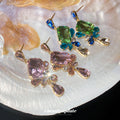 Faceted Crystal Floral Drop Stud Earrings with Polished Metal Tone Details view 4