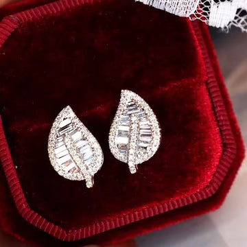 Leaf Shaped Pavé Crystal Stud Earrings in Silver Tone