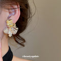 Two Tone Sculpted Flower Stud Earrings With Decorative Details view 3