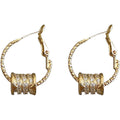 Gold Tone Twisted Hoop Earrings With Crystal Barrel Charms view 5